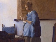 Woman in Blue Reading a Letter by Johannes Vermeer